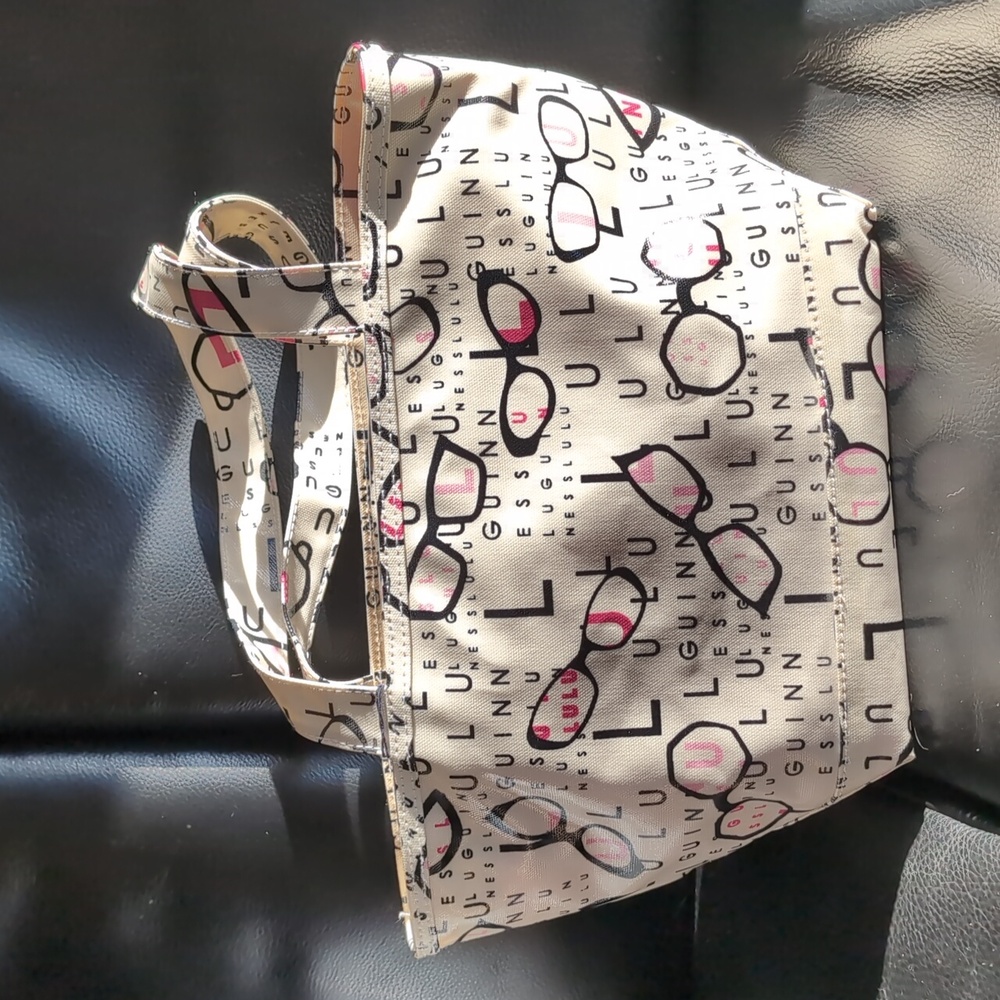 Lulu Guinness Erica set. Small makeup bag and purse. New with tags.